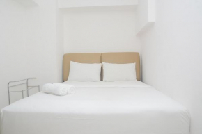 Minimalist and Stylish 1BR Bassura City Apartment By Travelio